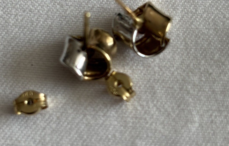 Two tone 9 carat gold twisted stud earrings.