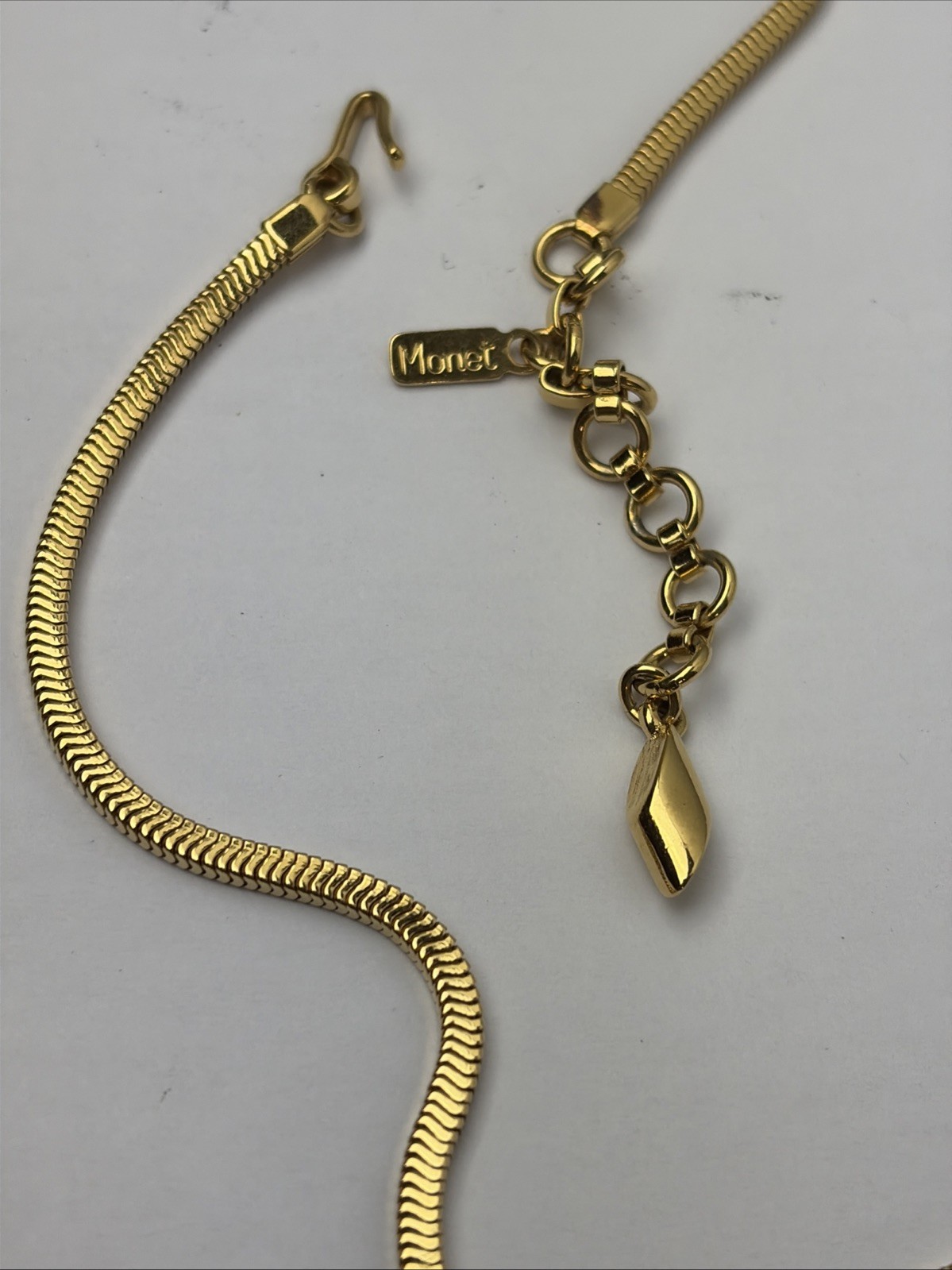 VINTAGE DESIGNER FASHION NECKLACE ~ LOVE KNOT LARIAT DROP DANGLE ~ MONET 16″