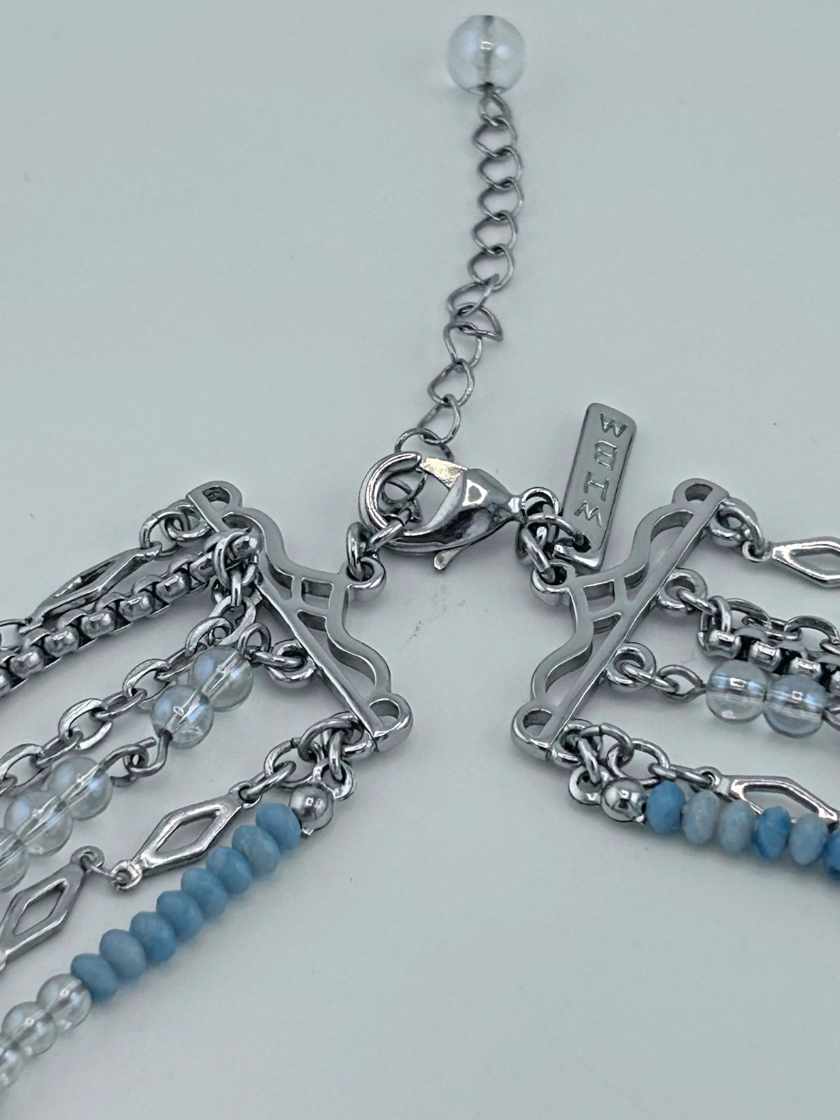 WHBM multi strand necklace. Pale Blue and icy-grey faceted seeds