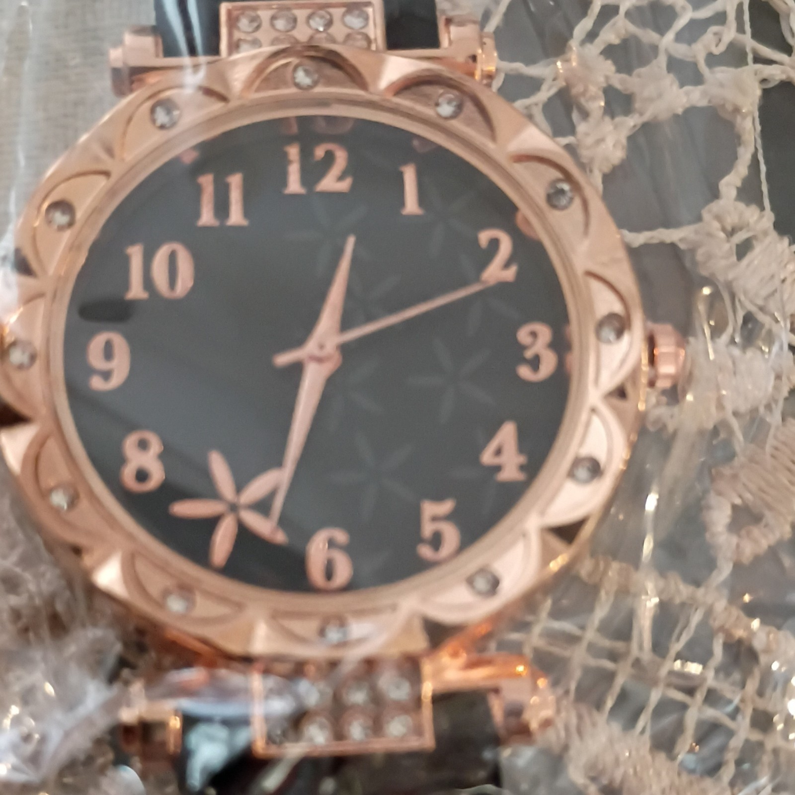 Women’s Rose Gold Tone Round Analog Wristwatch Black Band Floral Dial Arabic