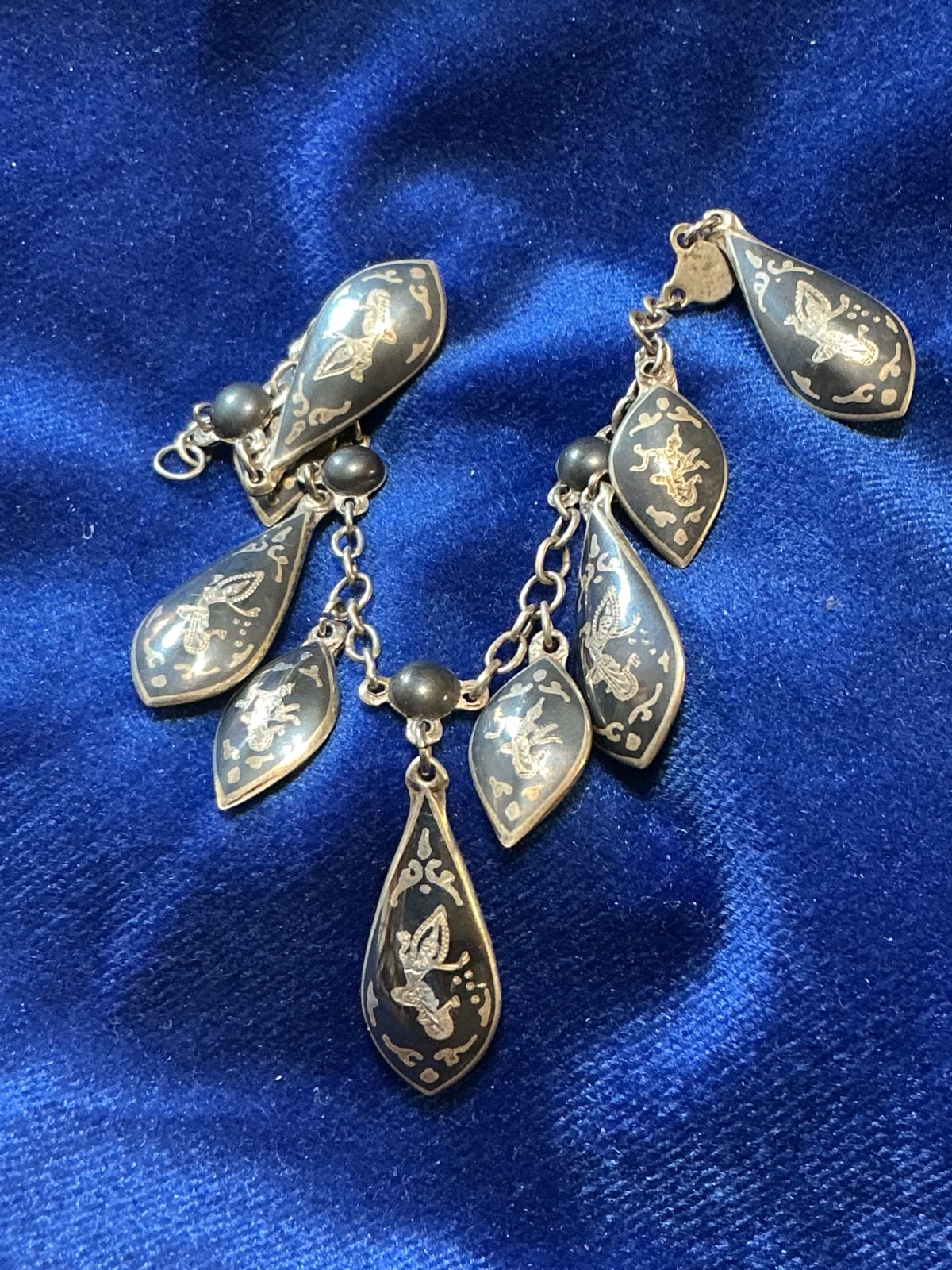 VINTAGE STERLING. SIAM BRACELET W/DANCING FIGURES