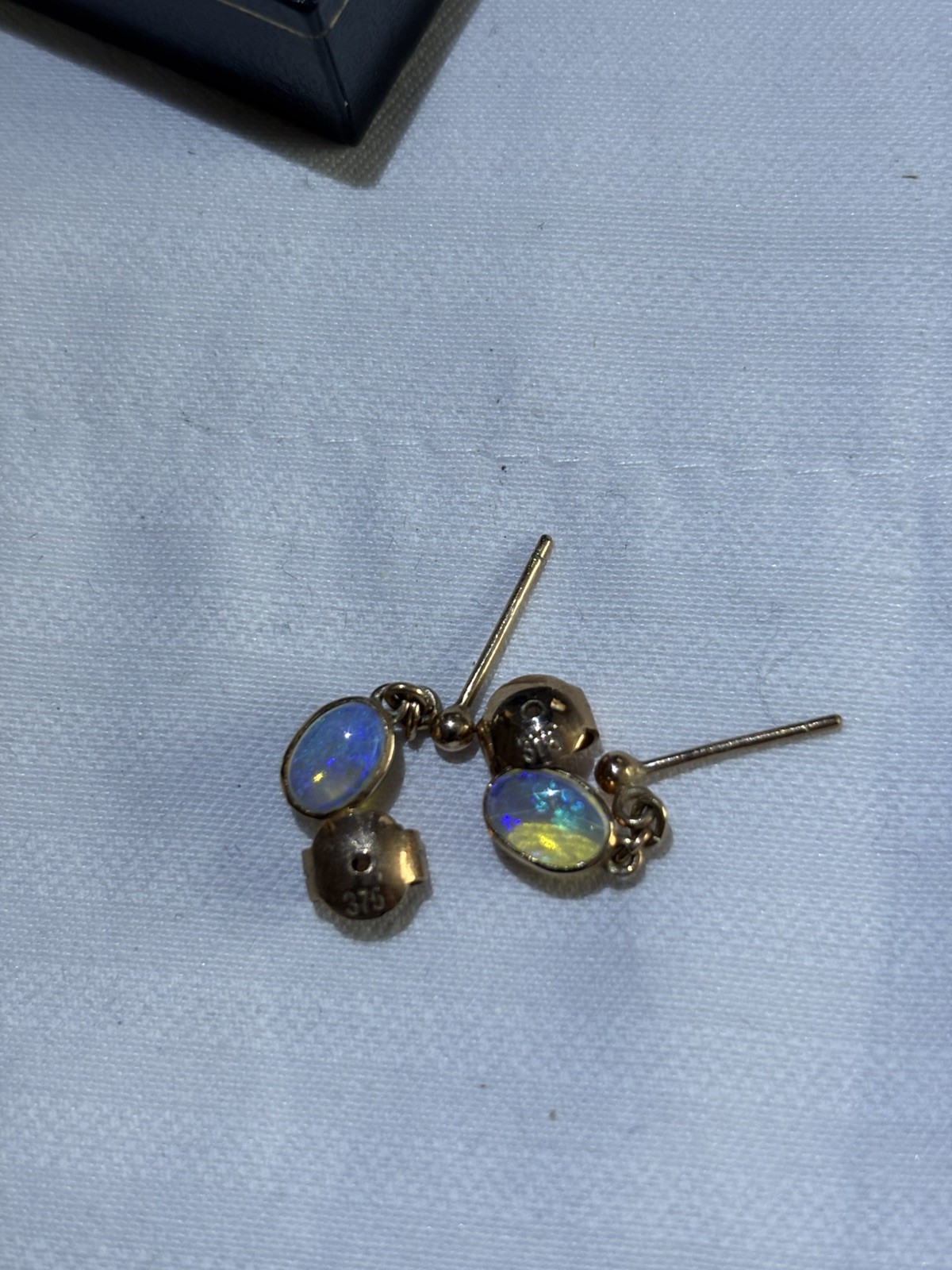9 Carat Yellow Gold 7X5mm Oval Opal. Drop Earrings.