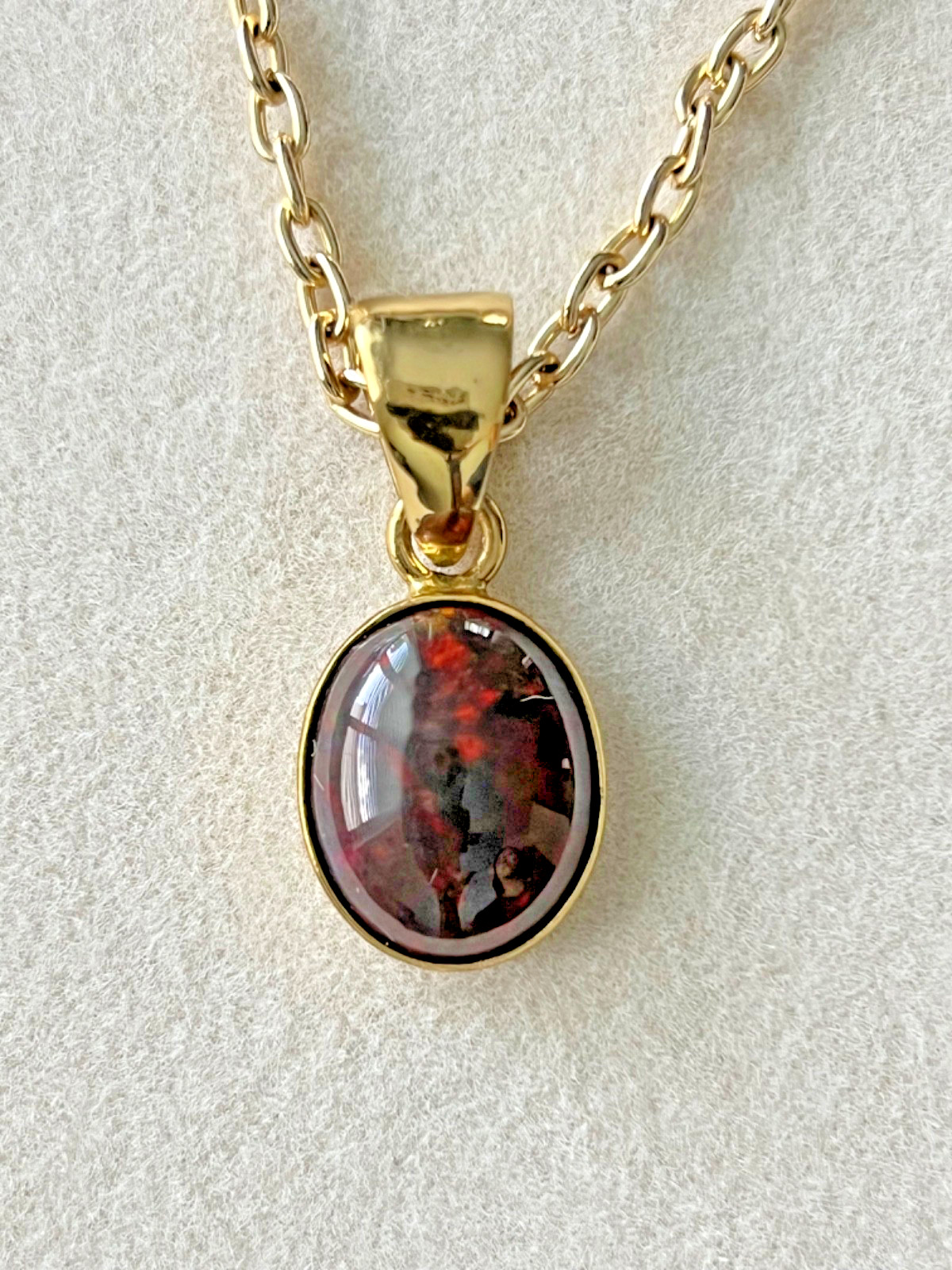 Ethiopian Opal Pendant by Charles Albert – Zero Karat Gold – Red Green Fire