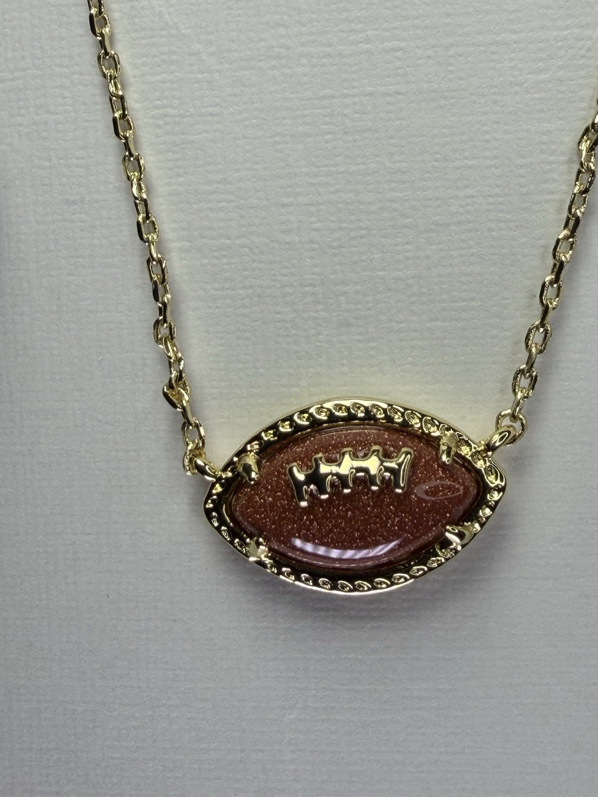 Kendra Scott Gold Plated Oval Goldstone Football Pendant Necklace Charm