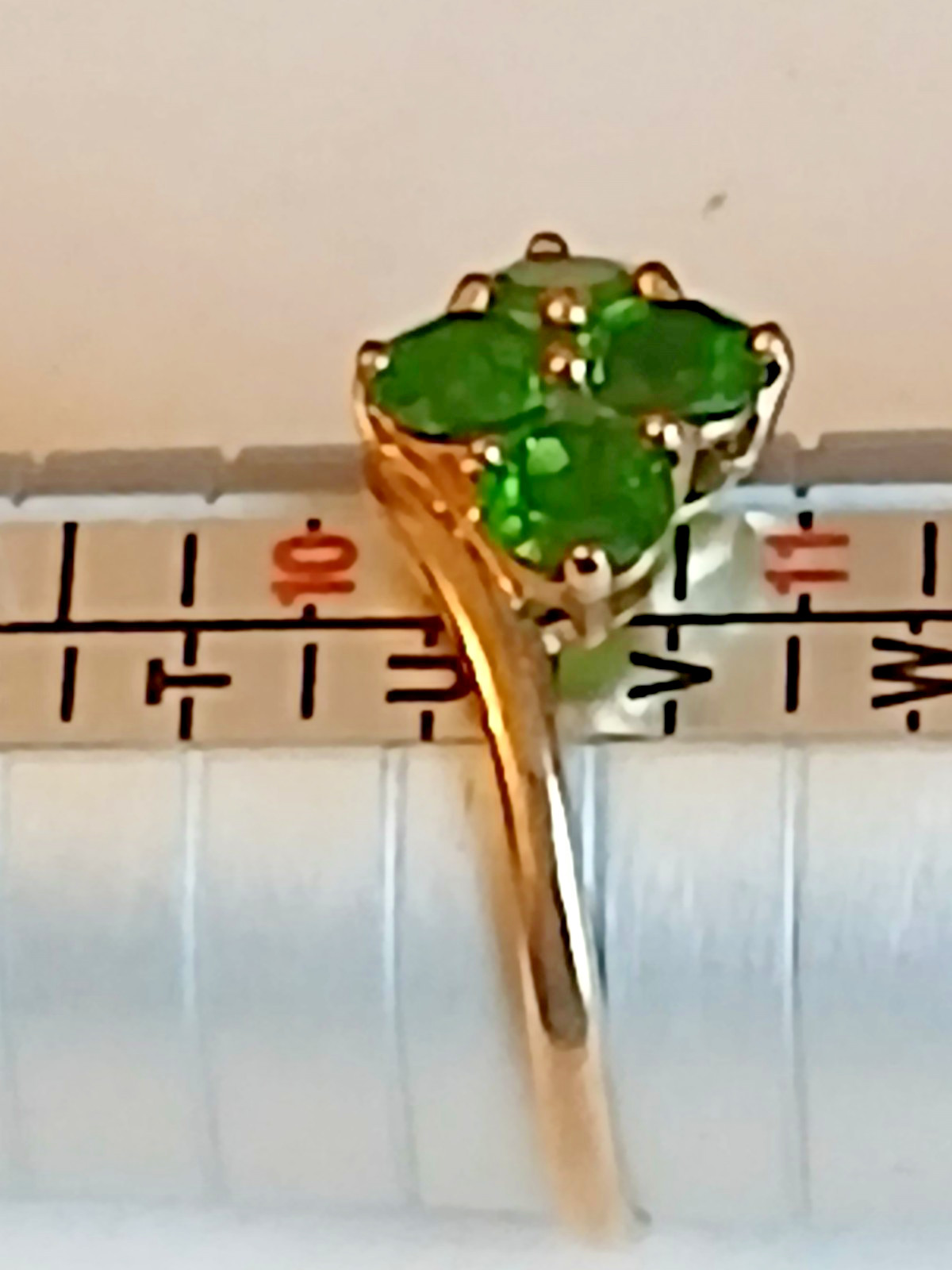 9 carat gold ring with 4 rare green garnets size u/v weight 2.75 grams
