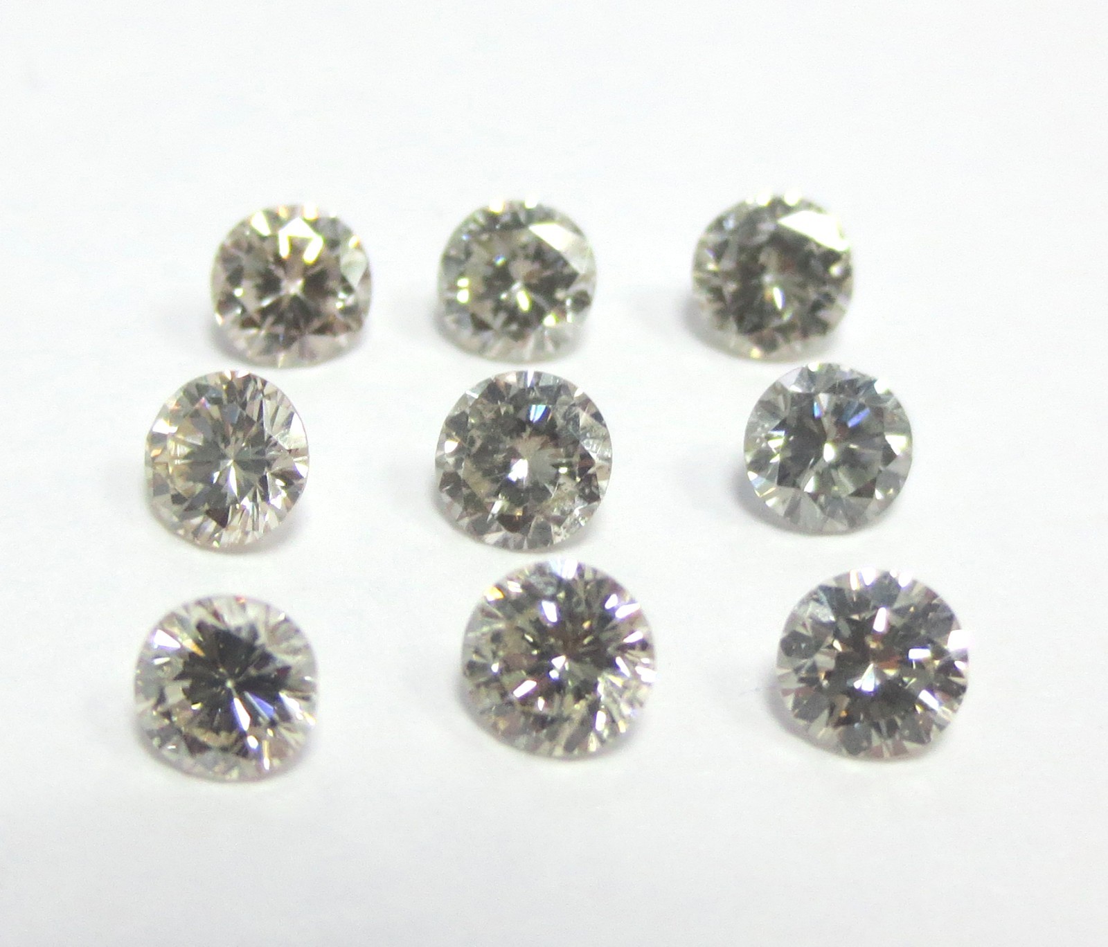 1 STONE 1.5mm TOP LIGHT BROWN CALIBRATED BRILLIANT ROUND POLISHED DIAMONDS