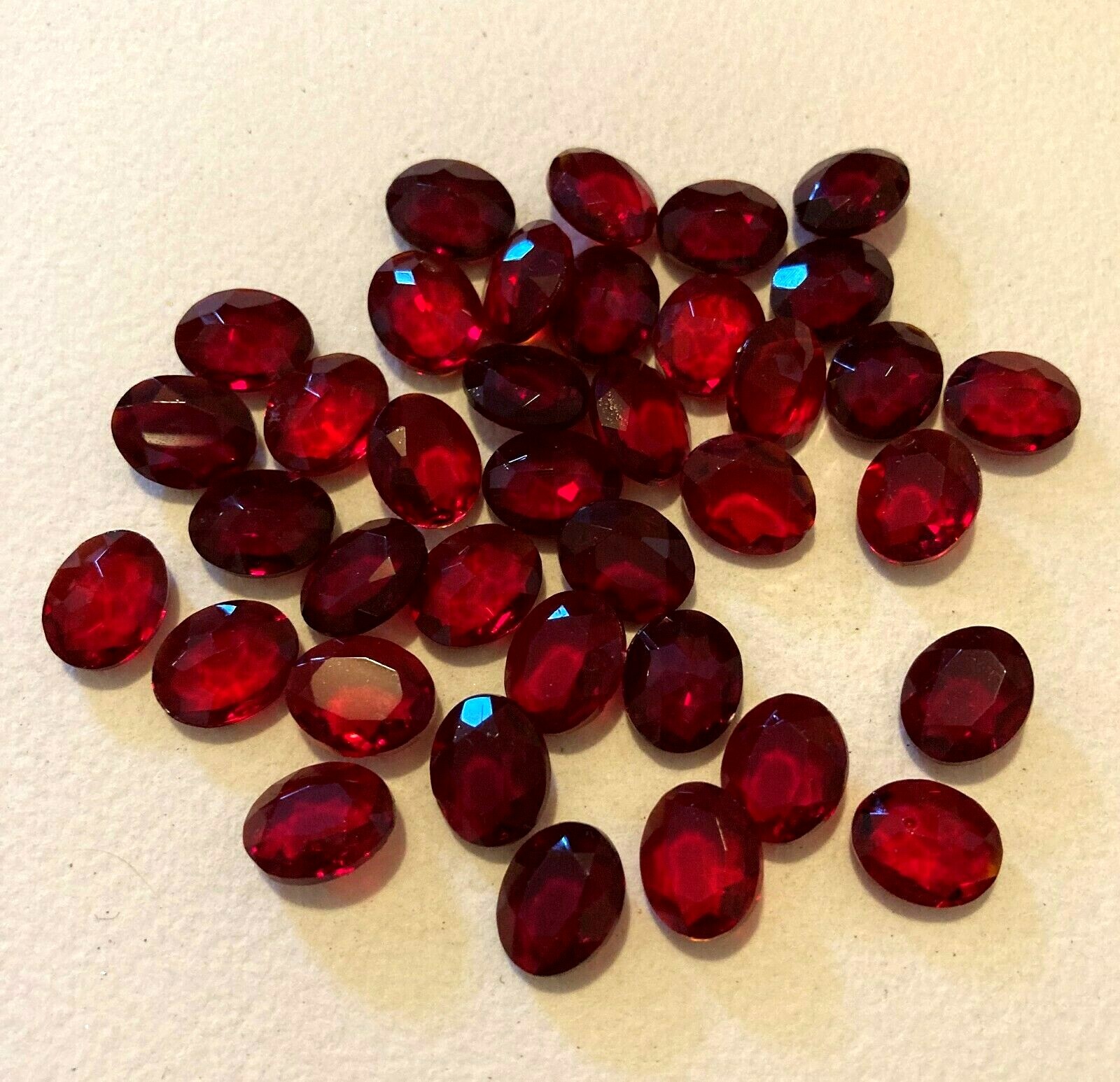 A152 Vintage glass stones 11x9mm ruby oval faceted top pointed back unfoiled(36)