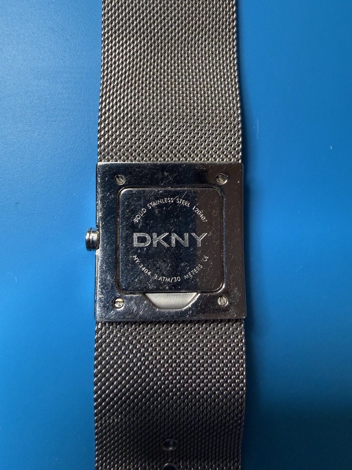 DKNY Women’s Silver Square Dial Mesh Band Quartz Wristwatch 30m
