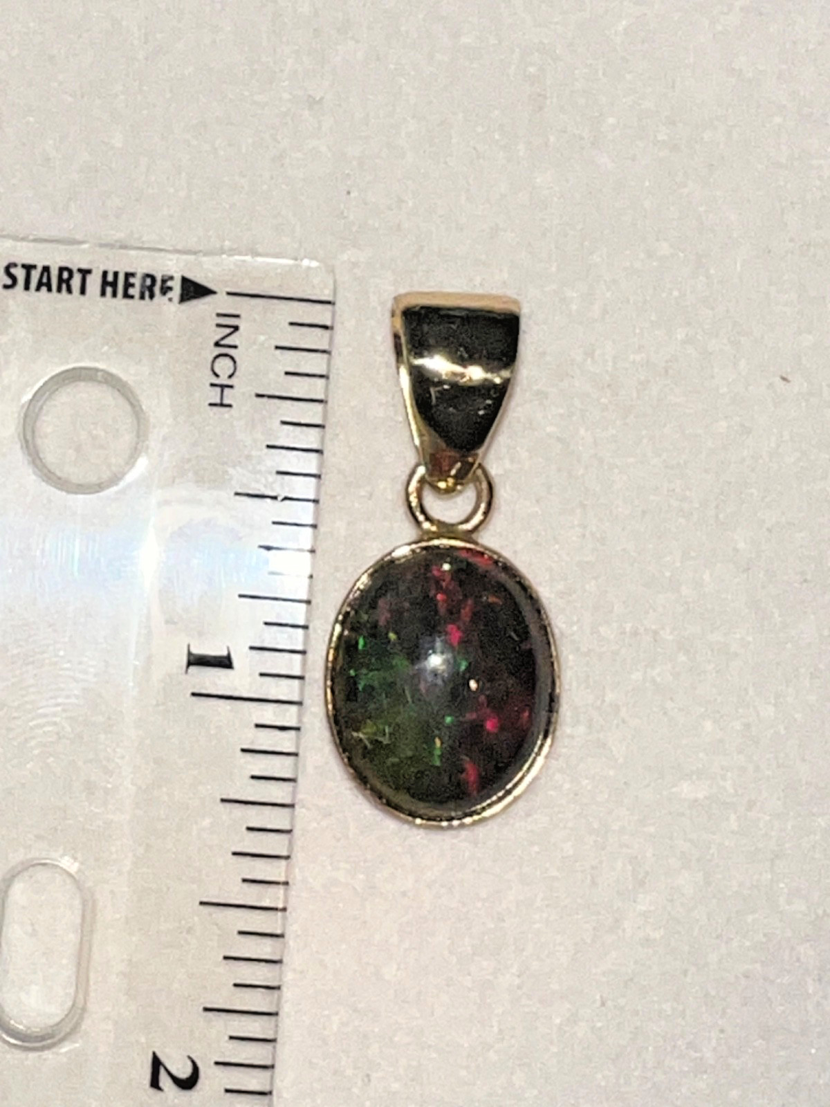 Ethiopian Opal Pendant by Charles Albert – Zero Karat Gold – Red Green Fire