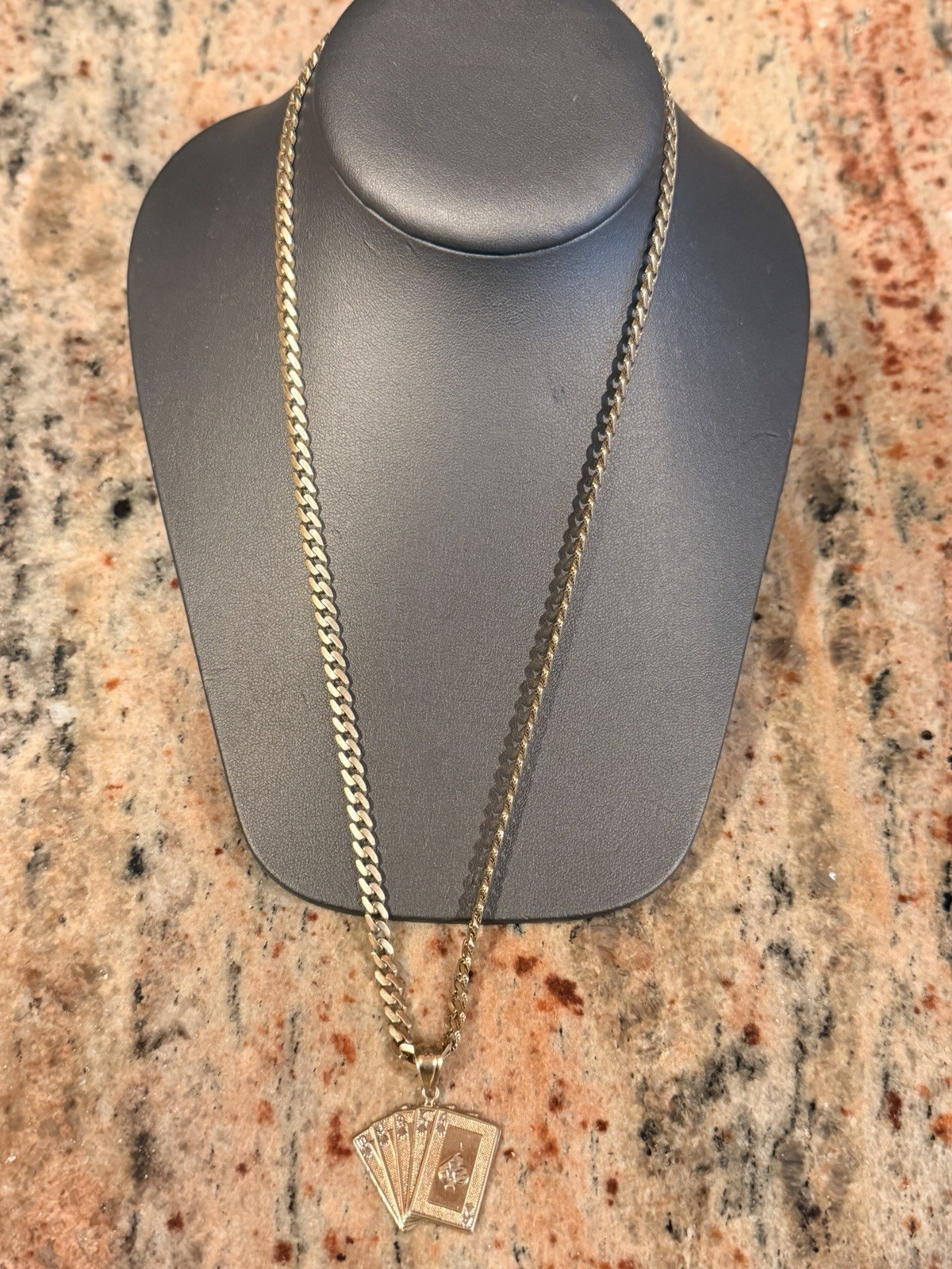 14kt 22″ Cuban 5mm 10.66 grams With 10k Cards Pendant