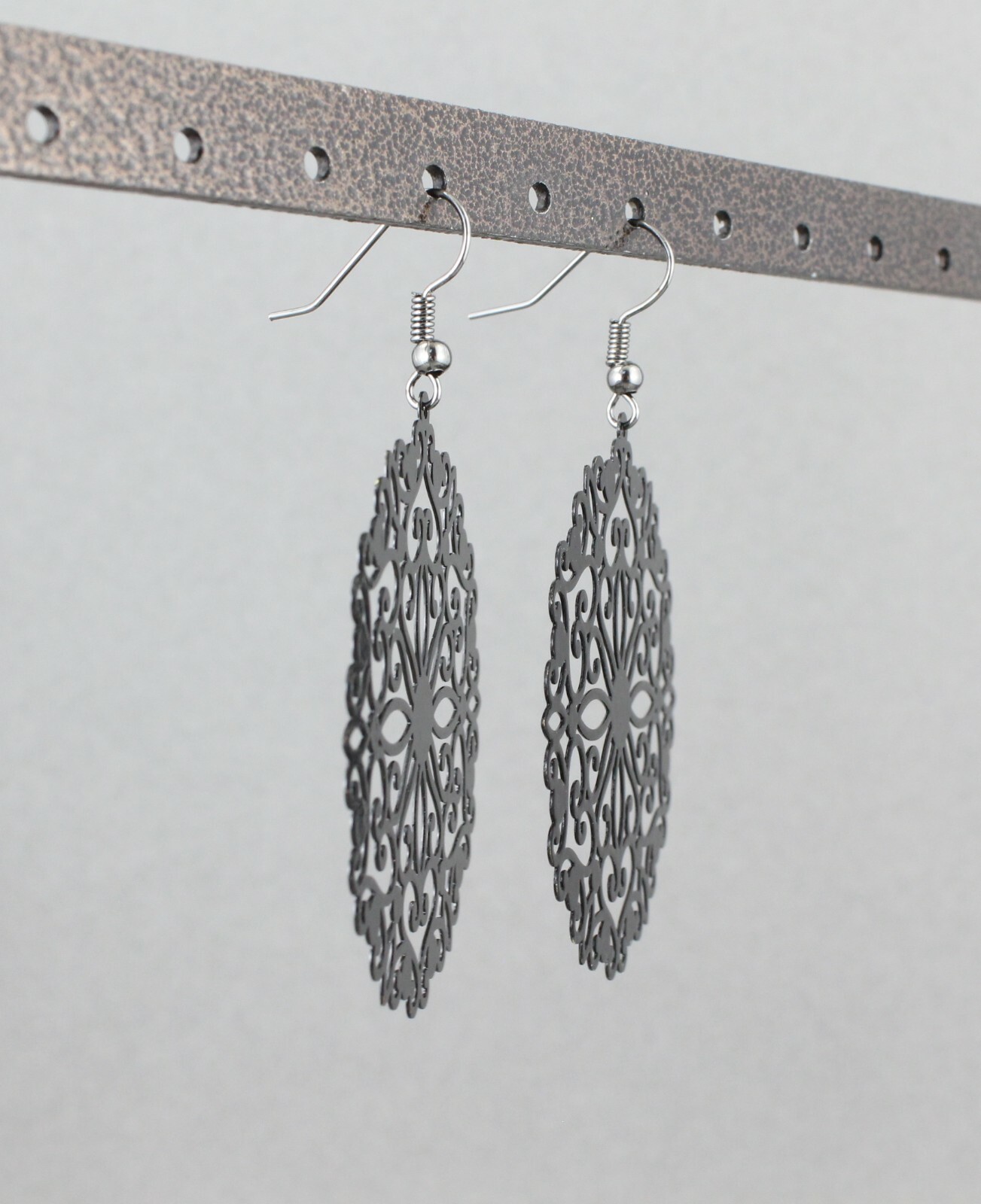 Black round earrings cut out lace filigree scroll circle 2.5″ long very Light