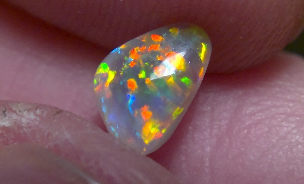 0.89cts Solid Lightning Ridge semi-black opal, extremely bright top gem + video