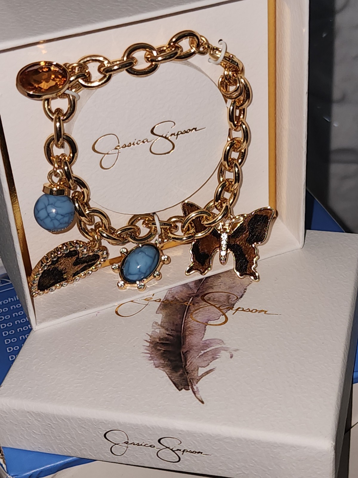 Jessica Simpson Gold Tone Charm Bracelet Blue Crystals Heart Butterfly