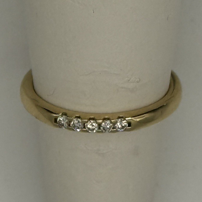 Brand new 14kt yellow gold natural diamond band with .11ct diamonds and 2.5grams