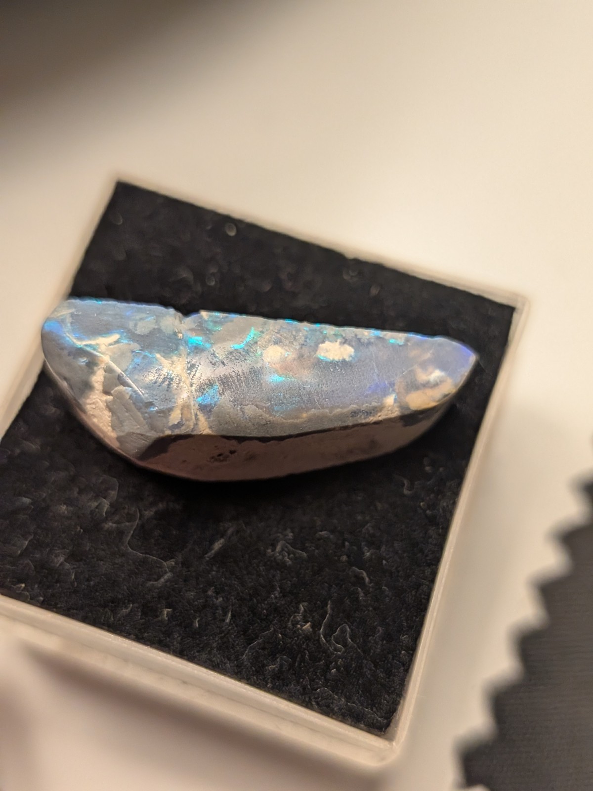 opal blue and green on black
