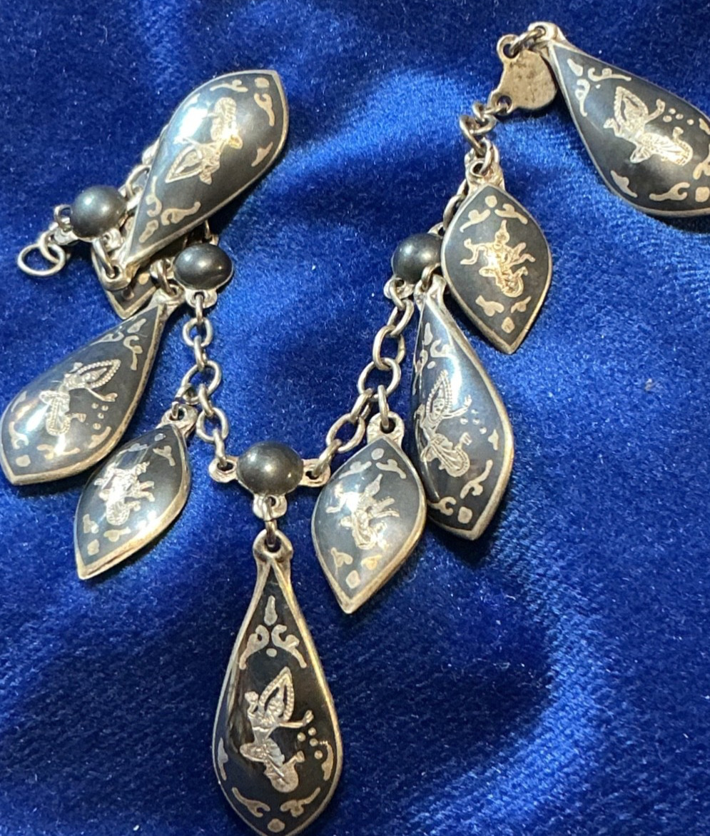 VINTAGE STERLING. SIAM BRACELET W/DANCING FIGURES