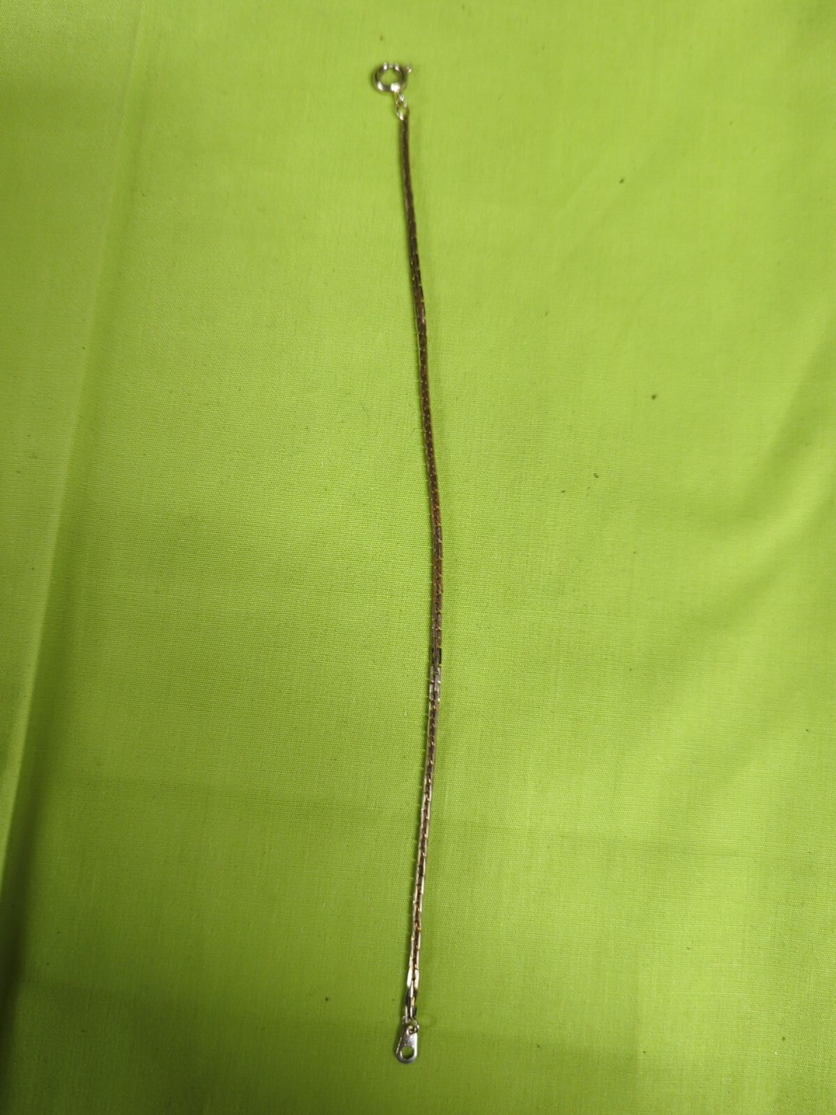Gold toned 7 inch bracelet
