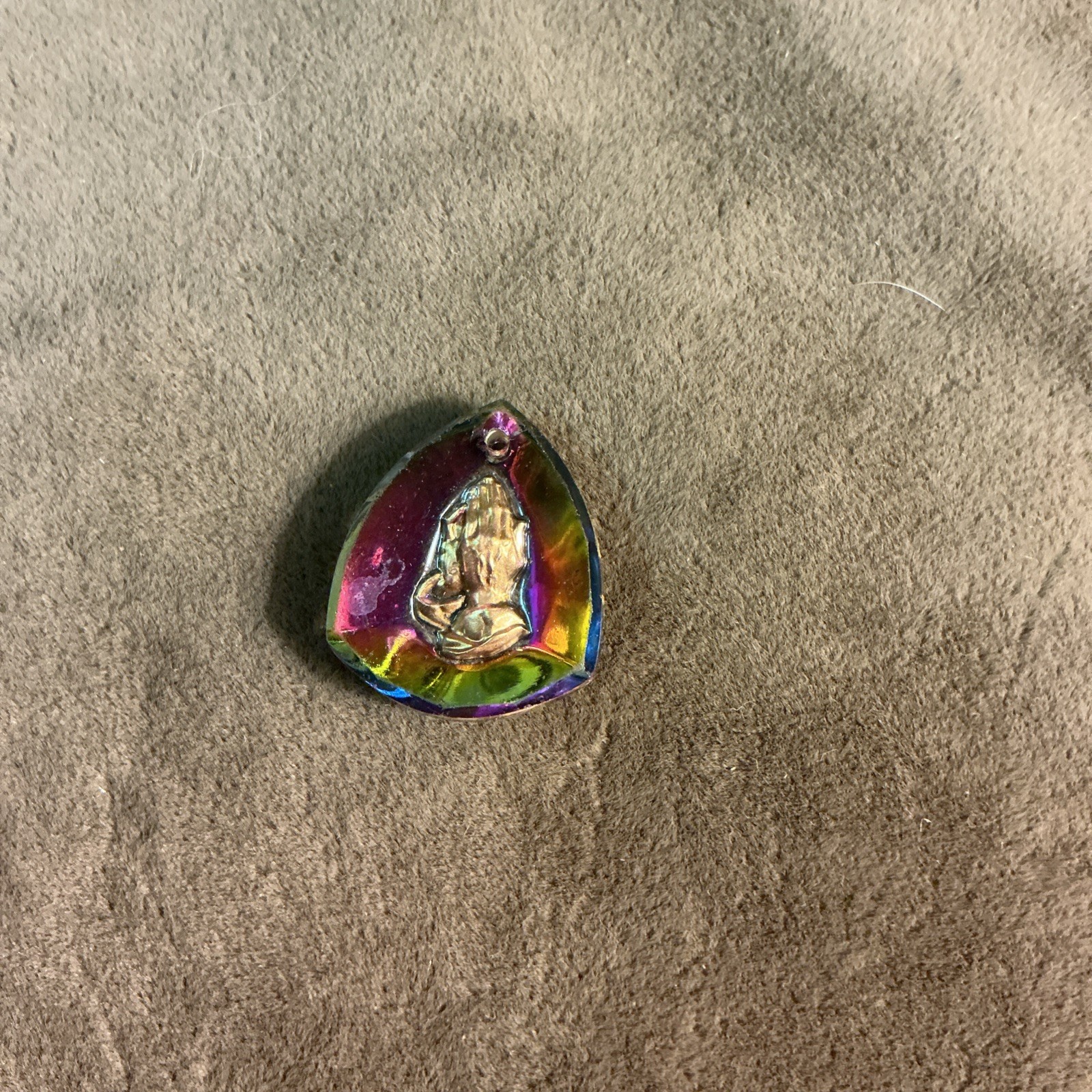 1970s necklace medallion praying hands design aurora borealis foil back Glass