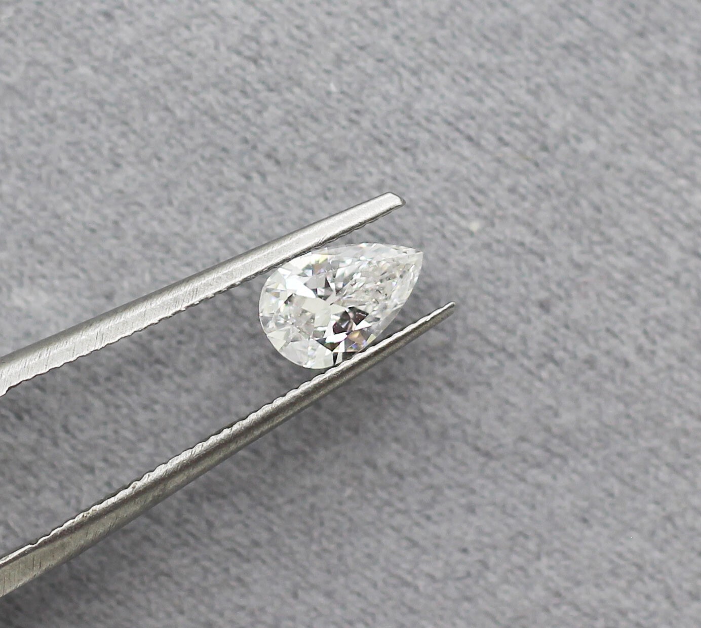 GIA Certified 0.66ct J/SI2 Laser Inscribed Pear Brilliant Cut Loose Diamond