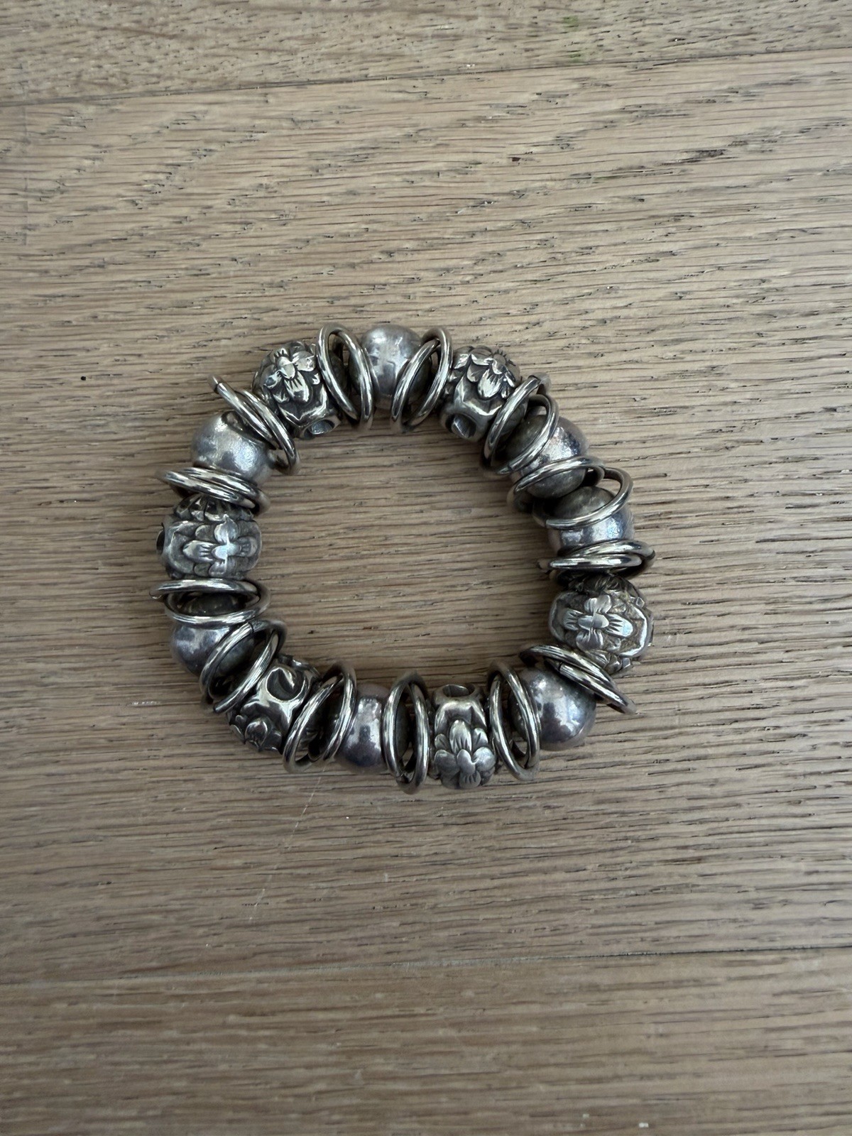 BRACELET, Bohemian, Silver Tone Multi-sized Beads Elastic Cord. Used very good.