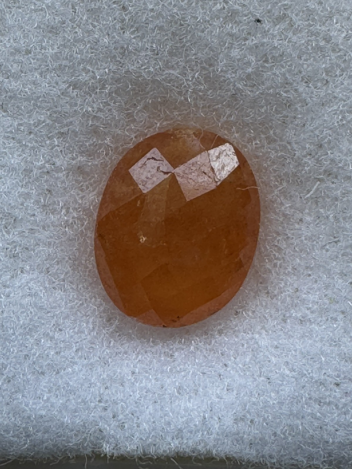 5.01 Carat, Orange Tangerine Garnet, 10 x 8 Oval, Very Slightly Included.