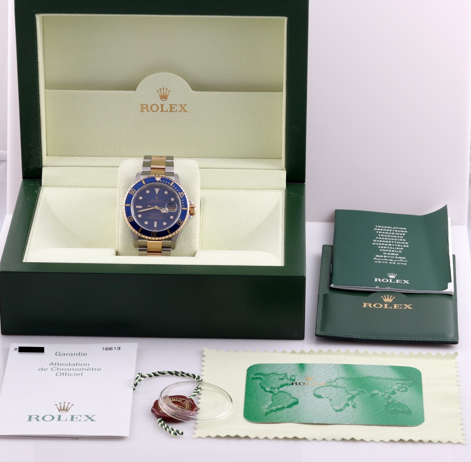 Rolex 2006 Submariner Date Blue SEL No Holes 18K Gold/Steel Box/Papers 16613
