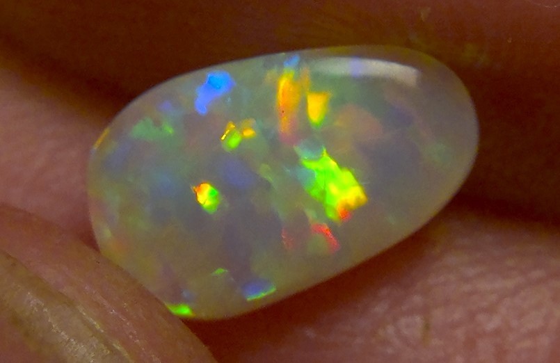 0.87cts Solid Lightning ridge opal, stunning rainbow fire *see video*