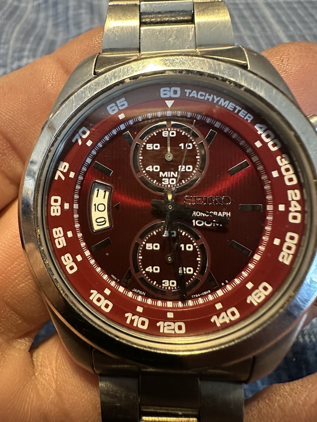 Seiko Quartz Chronograph 100m Red Sunburst Dial Tachymeter Steel Bracelet