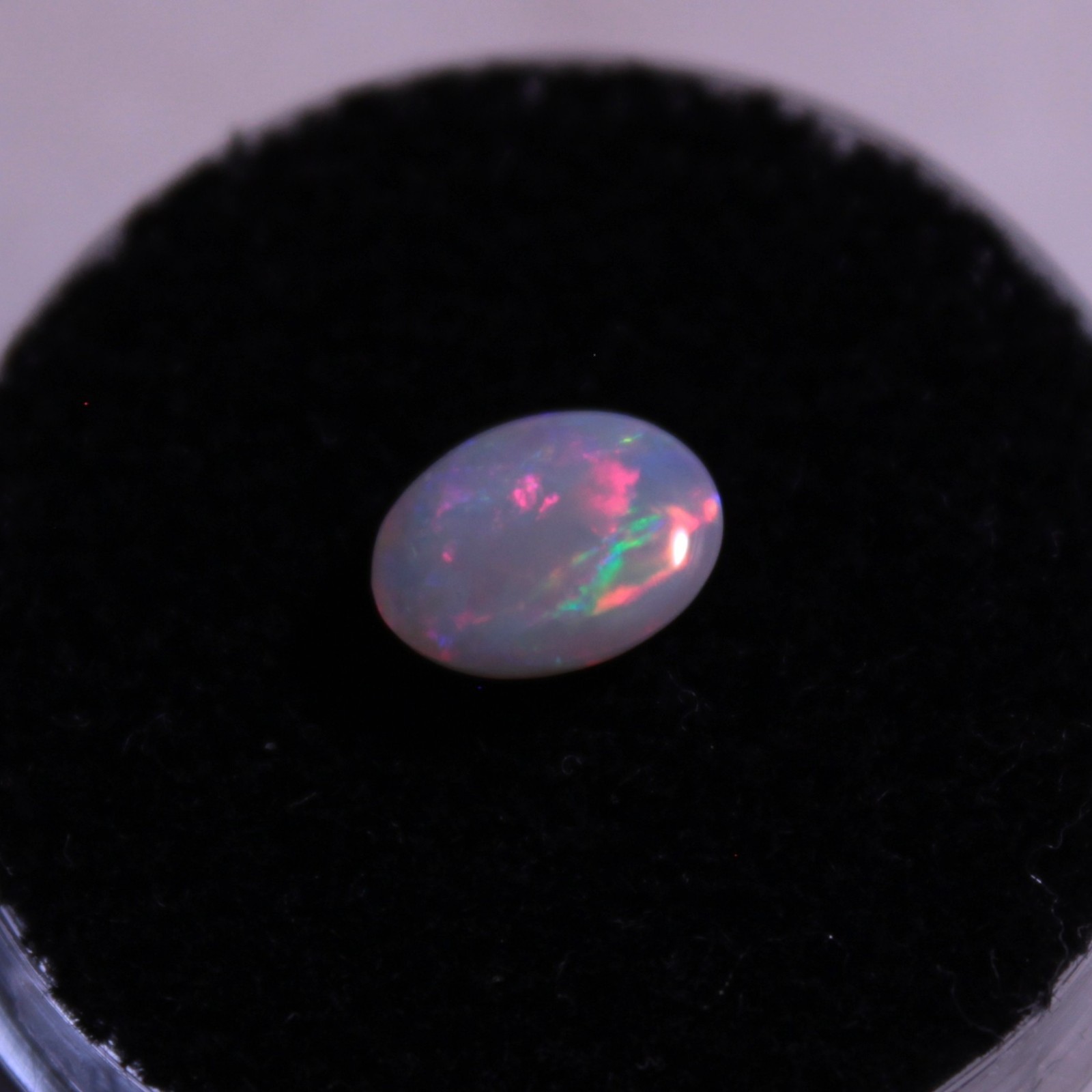0.8ct solid Australian double-sided light opal, gorgeous reds and more