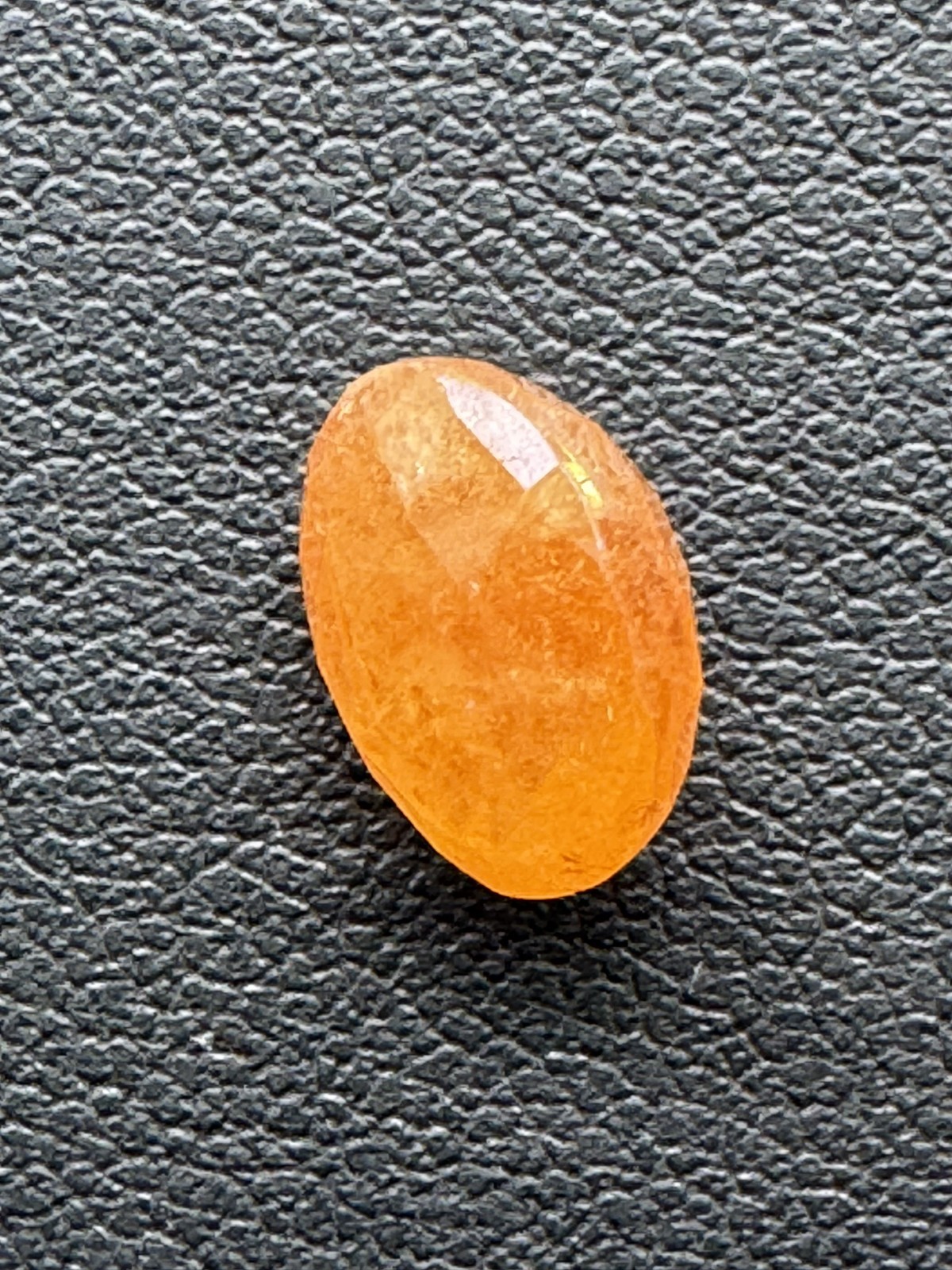 5.01 Carat, Orange Tangerine Garnet, 10 x 8 Oval, Very Slightly Included.