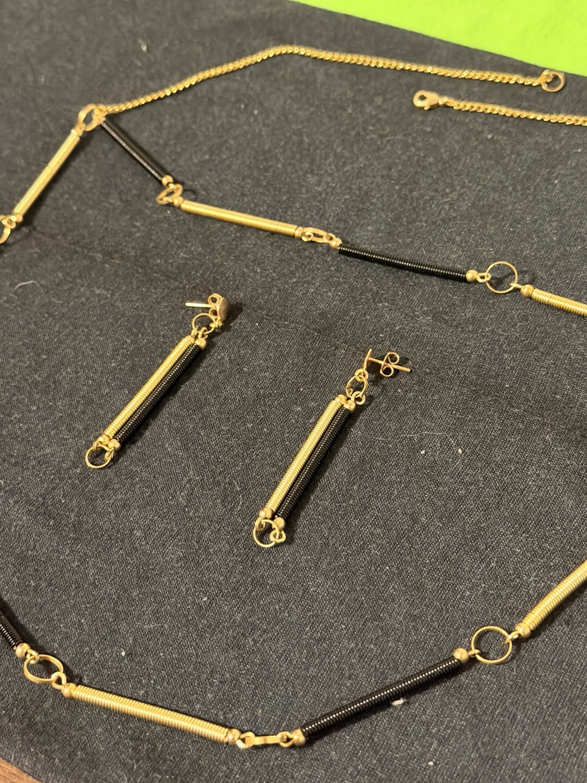 Abstract Gold‑Tone Black Coil Necklace & Earrings Set Modern Industrial Design