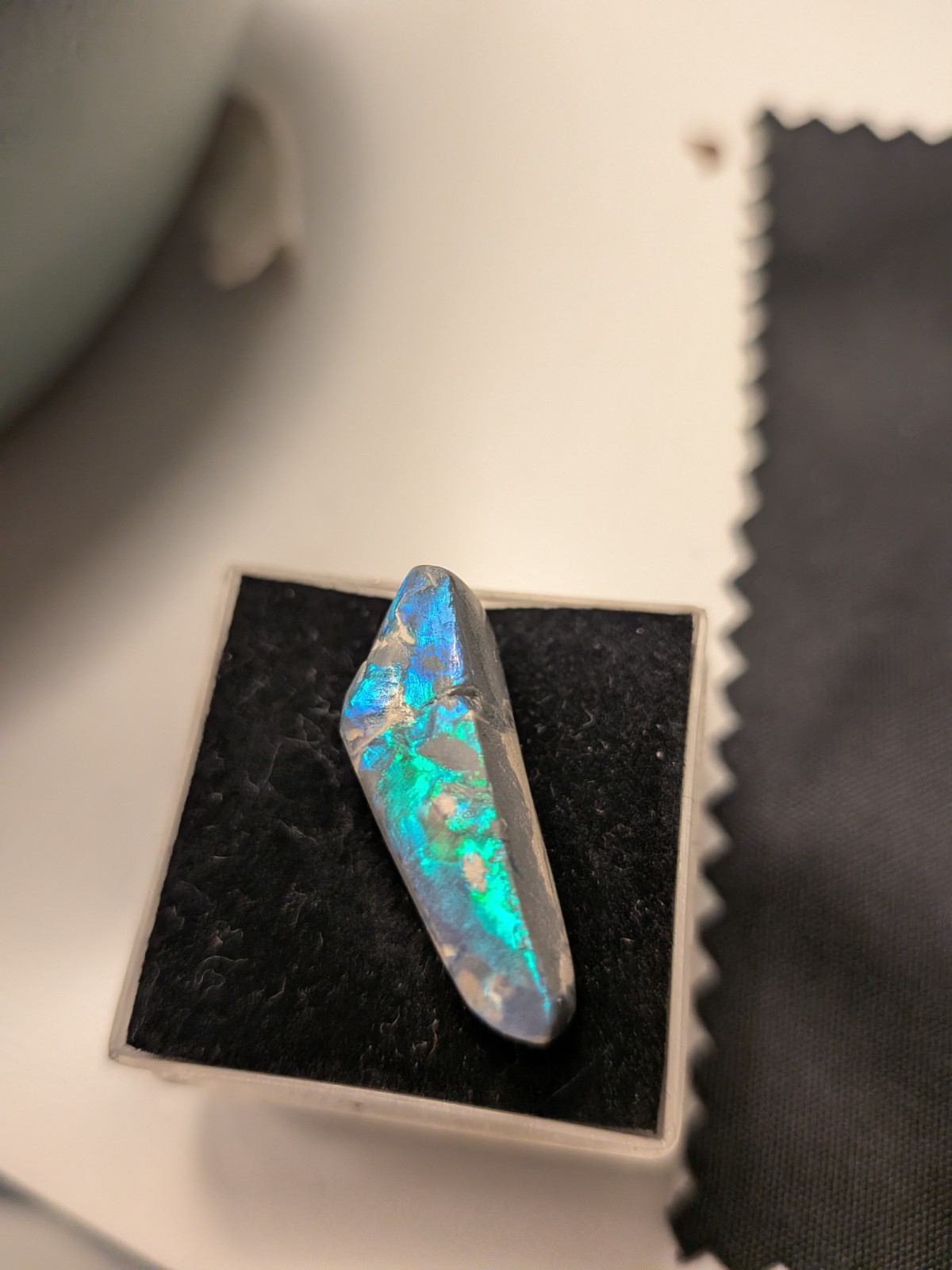 opal blue and green on black