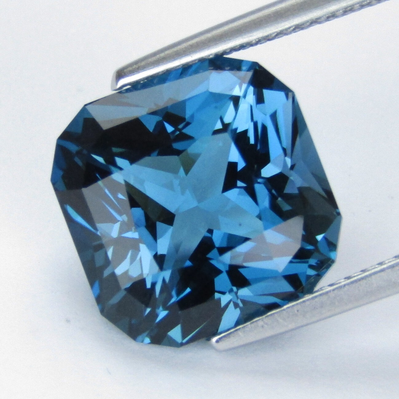 10.49Ct Striking Natural London Blue Topaz 12.3mm Cushion Precision Cut Gemstone