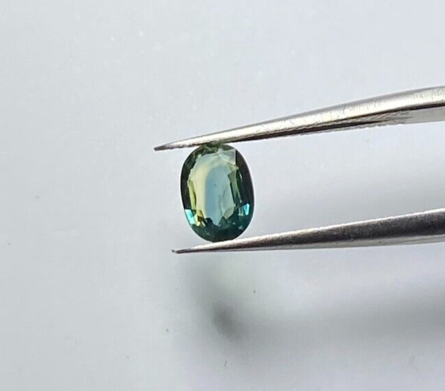 0.82 CTS HEATED MADAGASCAR BLUE/GREEN SAPPHIRE, OVAL CUT 6.5 X 5 X 2.8 MM VVS