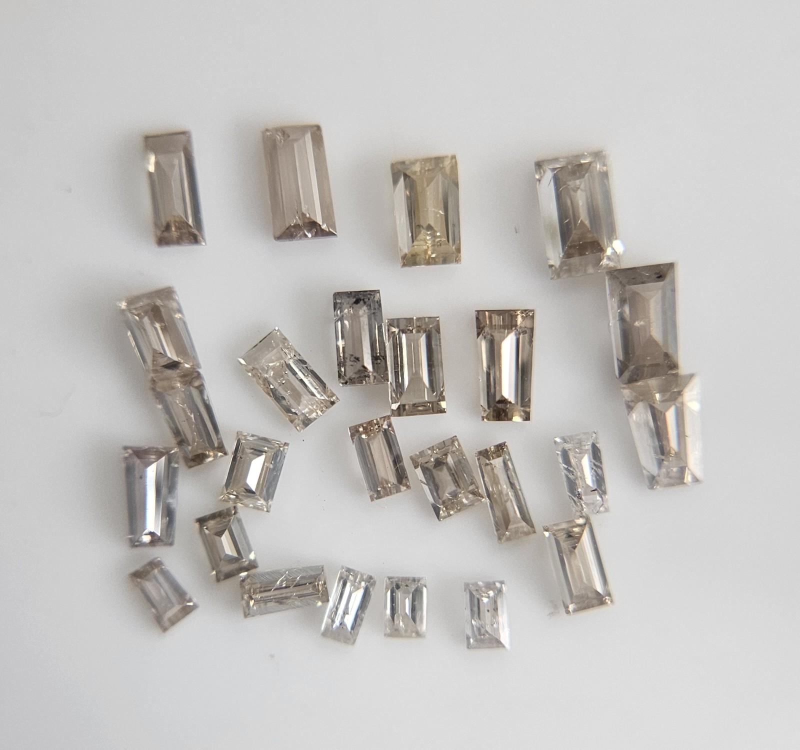 1CT (33-35pcs avg) 1.5 to 3.0 MM Natural light Brown Tapered baguette diamond.