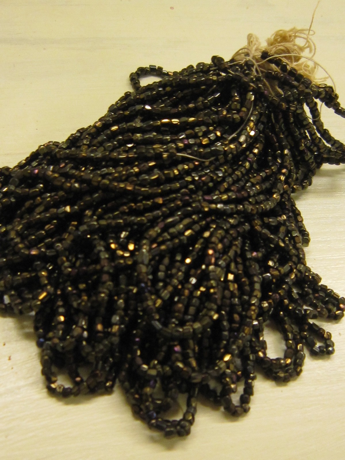 Hank Czech vintage dark topaz lustre faceted micro seed glass beads