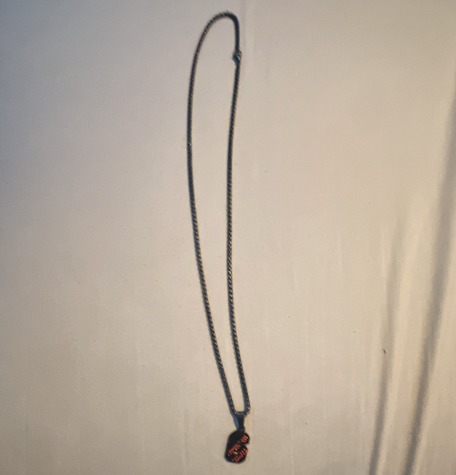 Black Metal chain with black aux baseball pendant
