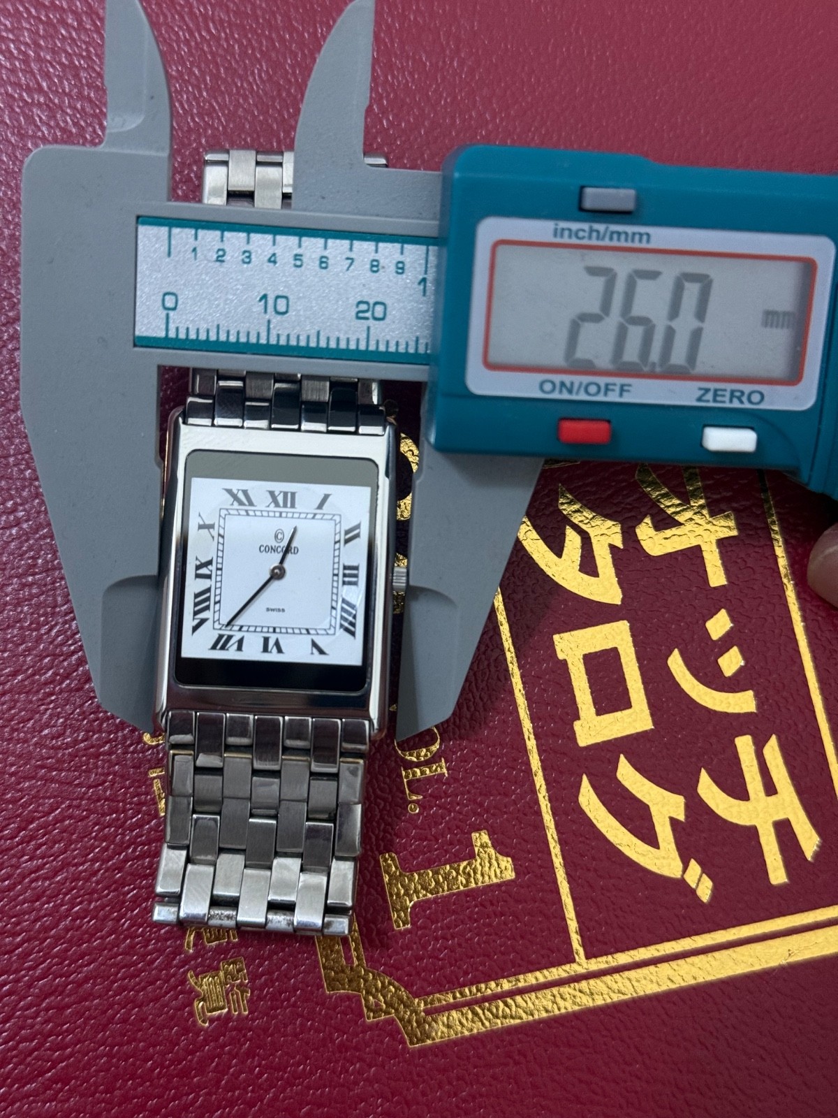 Vintage Concord Swiss Quartz Tank Watch Roman Dial Stainless Steel 26×34.5mm