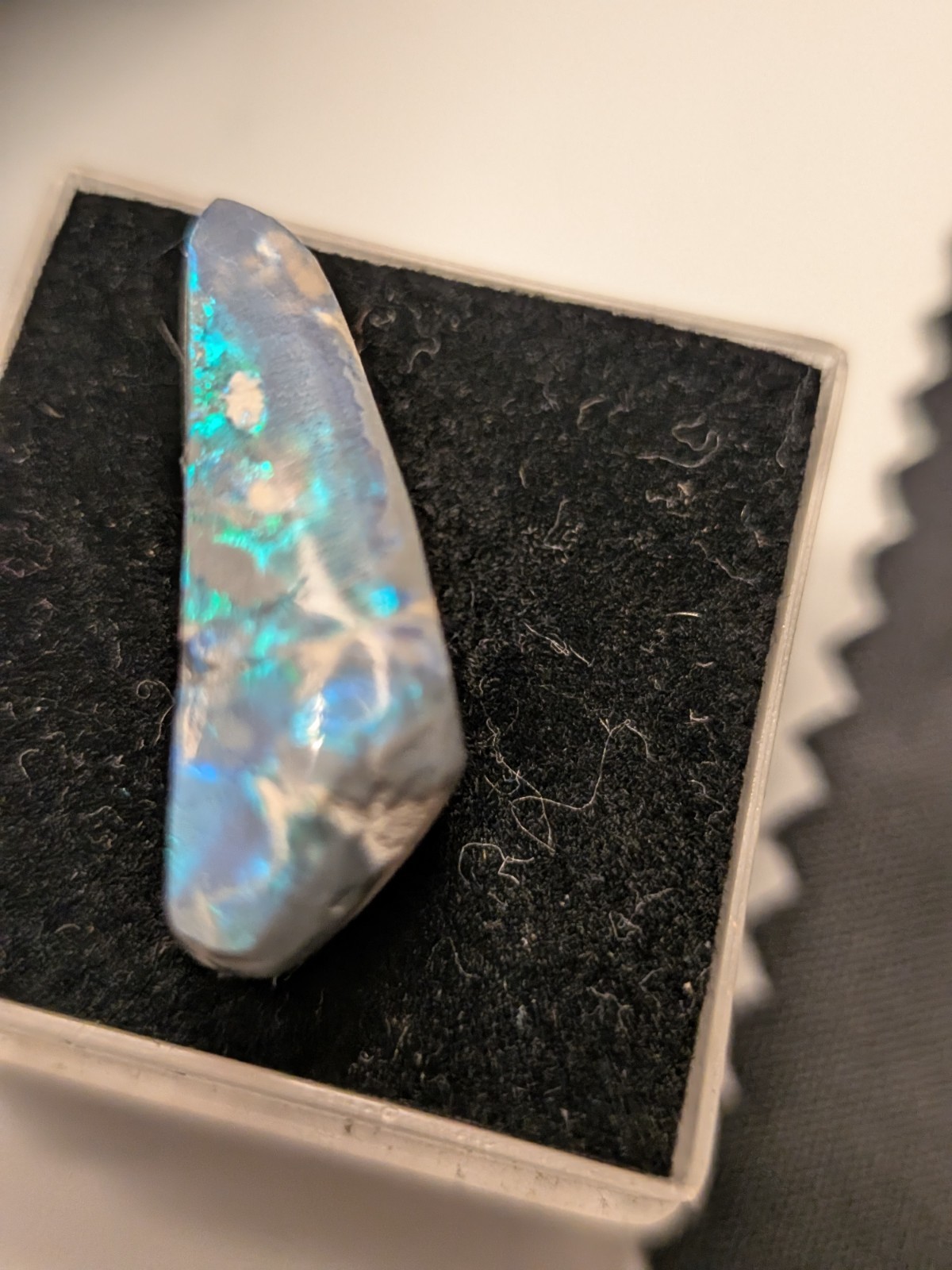 opal blue and green on black