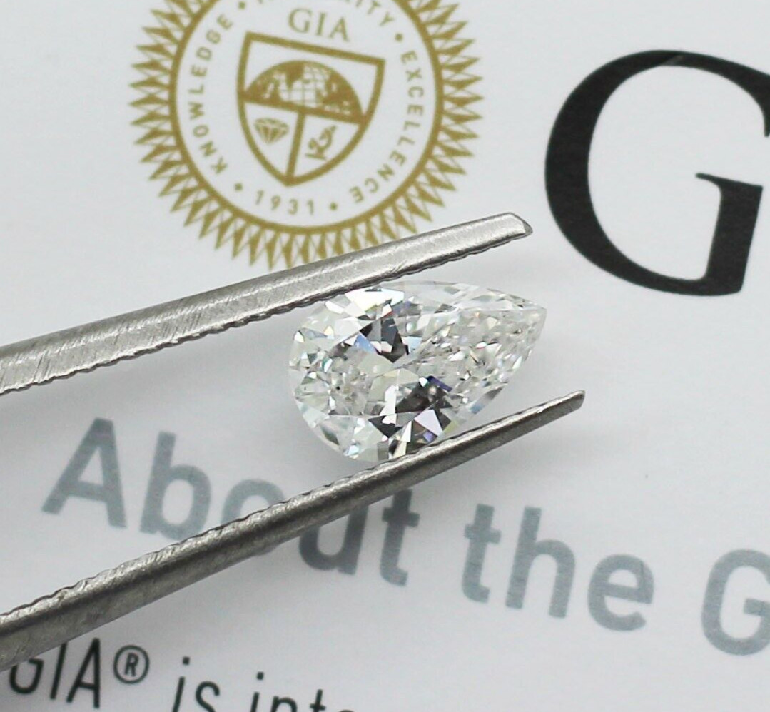 GIA Certified 0.66ct J/SI2 Laser Inscribed Pear Brilliant Cut Loose Diamond