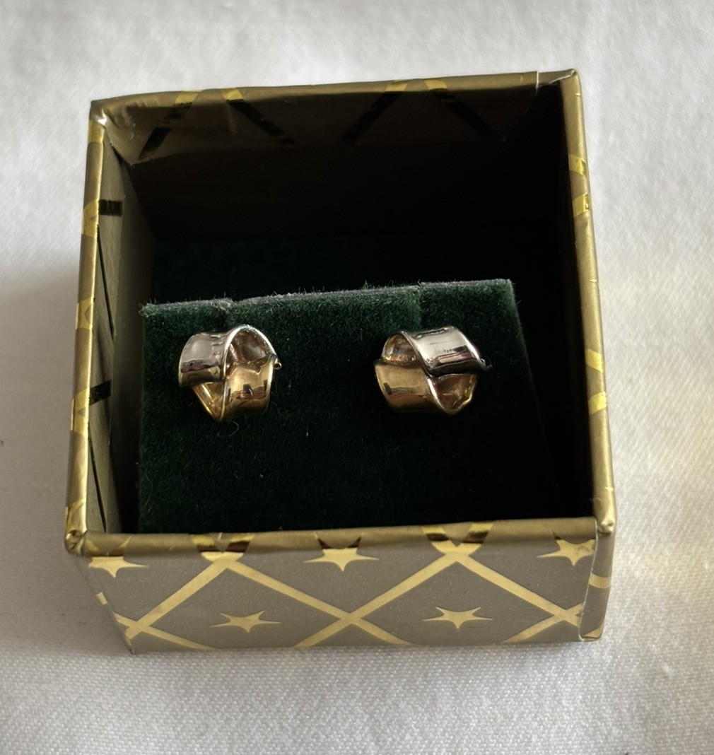 Two tone 9 carat gold twisted stud earrings.