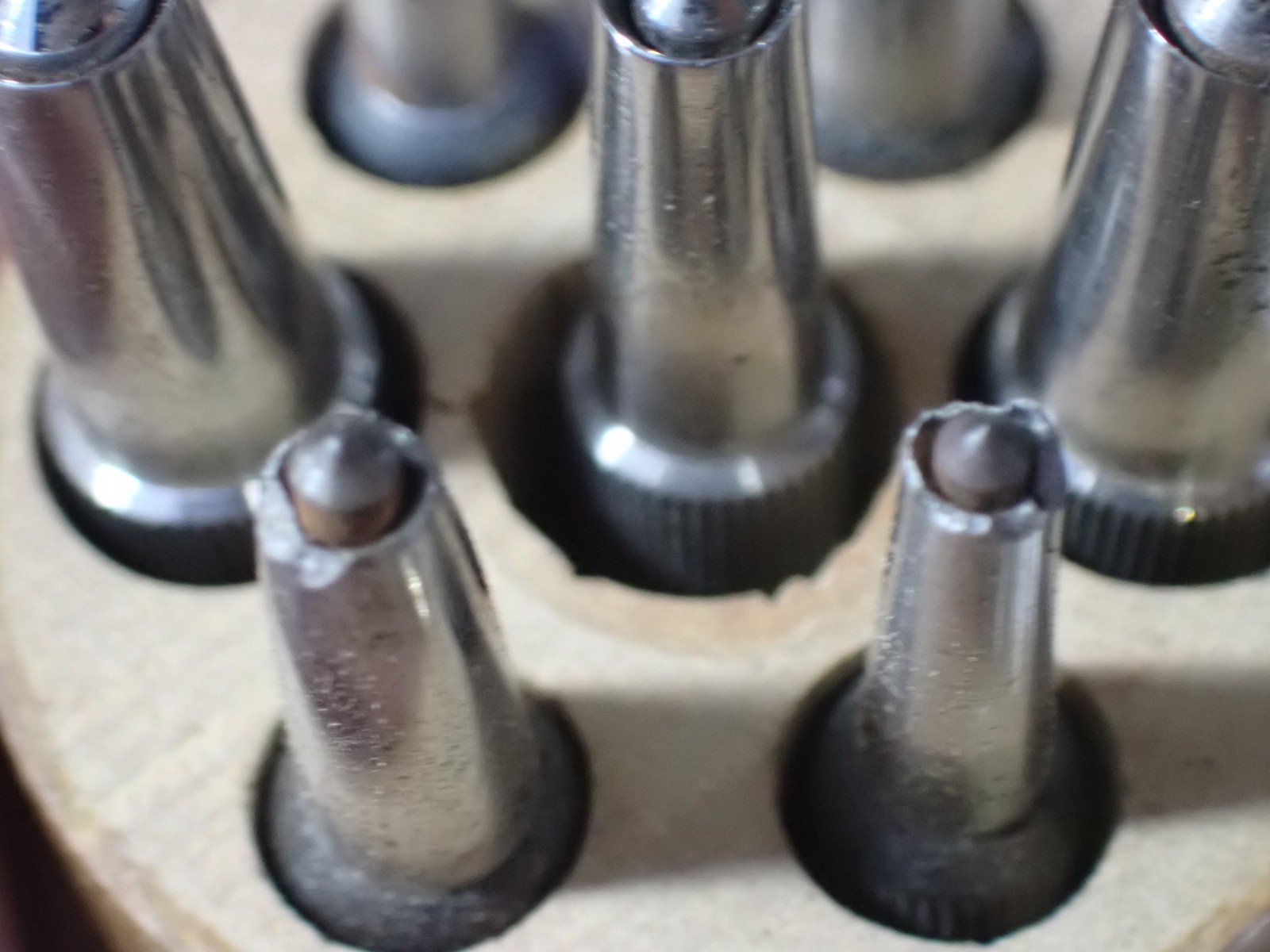 7 Unbranded Watchmakers Hole Closing Punches with Grooved Handles very good