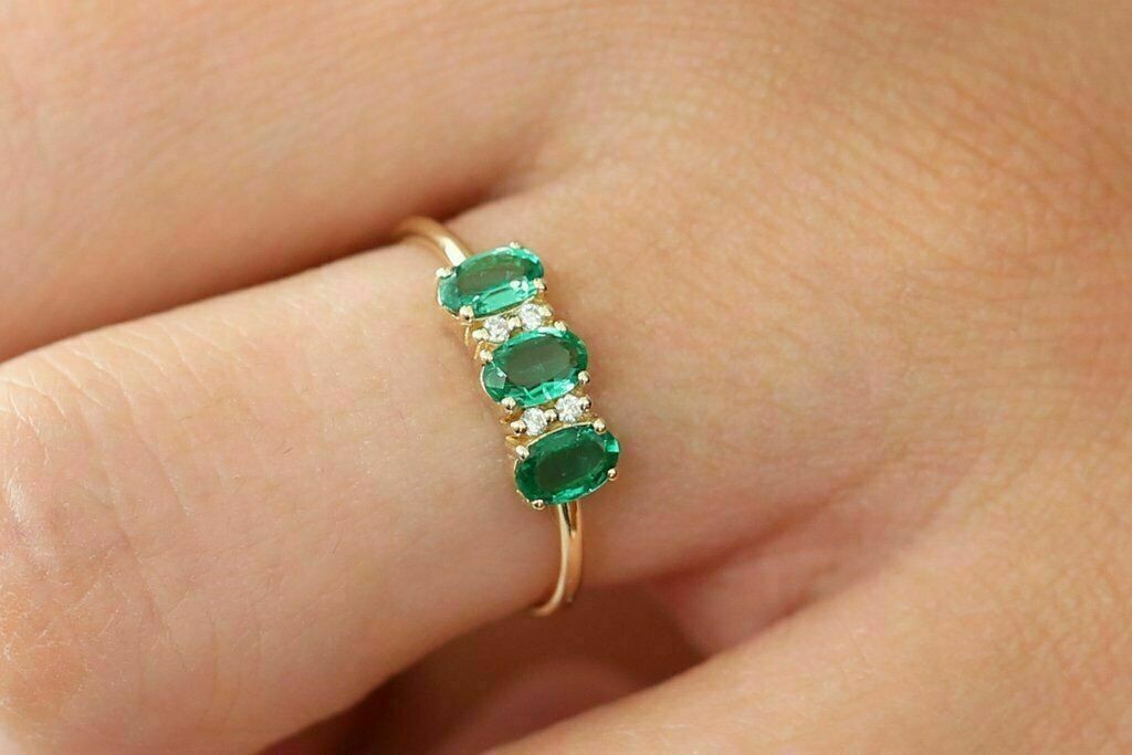 2Ct Oval Cut Lab Created Green Emerald Three-Stone Ring 14K Yellow Gold Plated