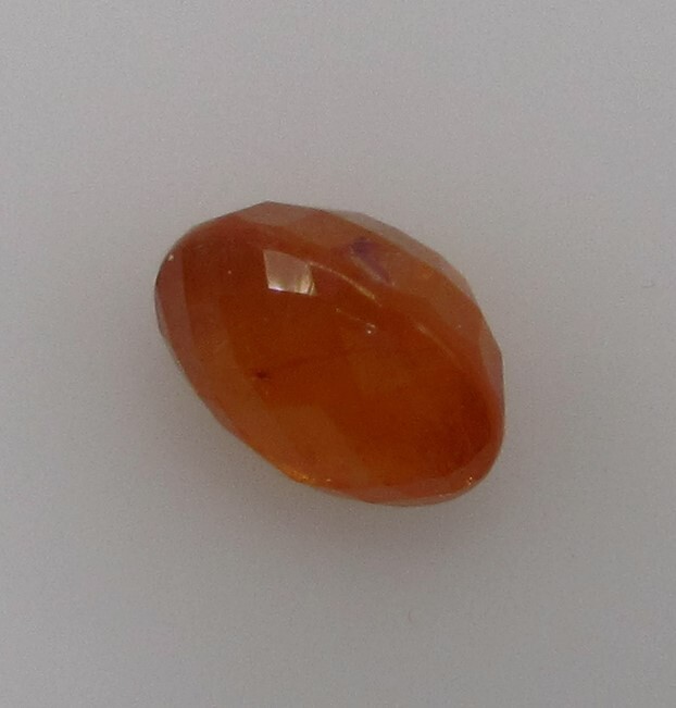 5.02 Carat, Yellow Orange Tangerine Garnet, 10 x 8 Oval, Very Slightly Included.