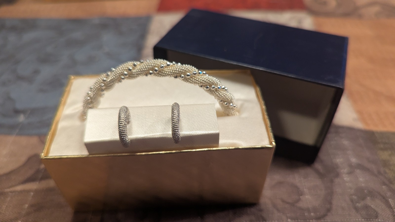 Silver Tone Twisted Bracelet And Earrings