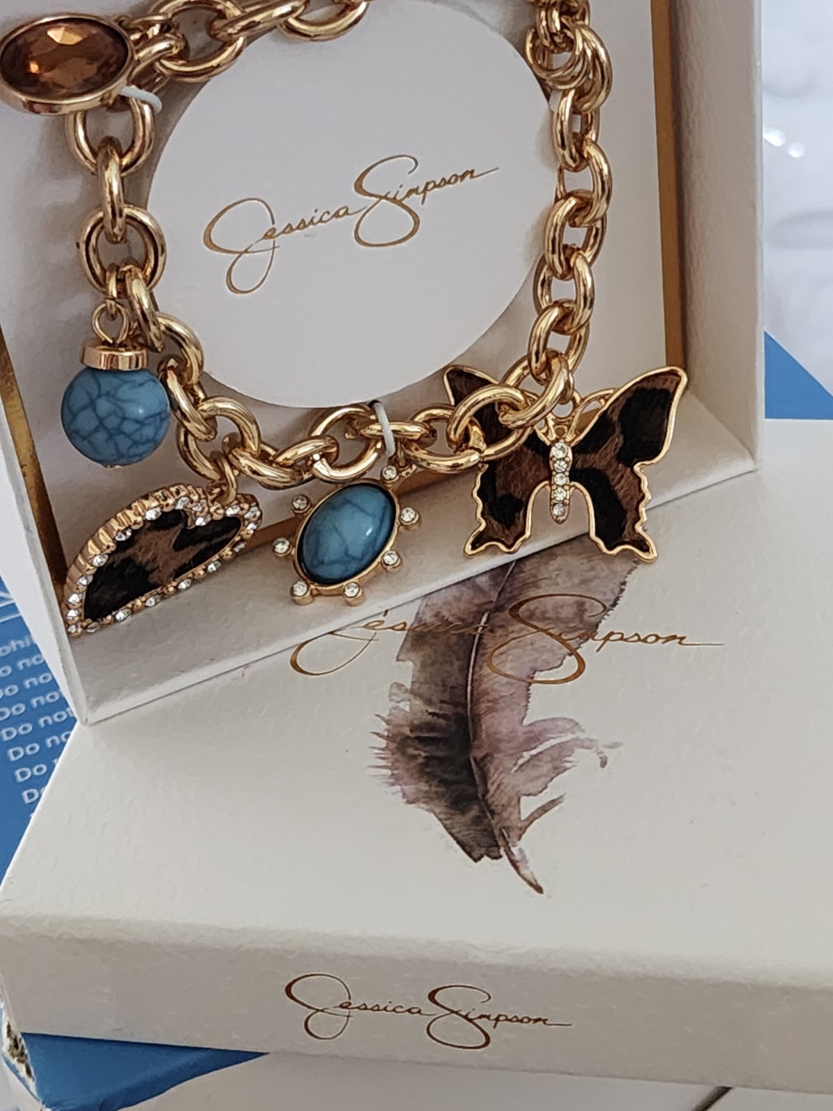Jessica Simpson Gold Tone Charm Bracelet Blue Crystals Heart Butterfly