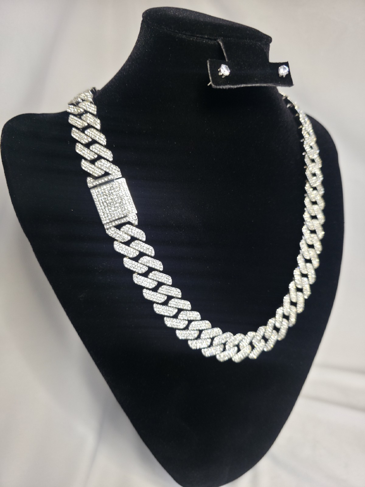 24” 3 Row Moissanite Cuban Link Chain in 925 Sterling Silver.