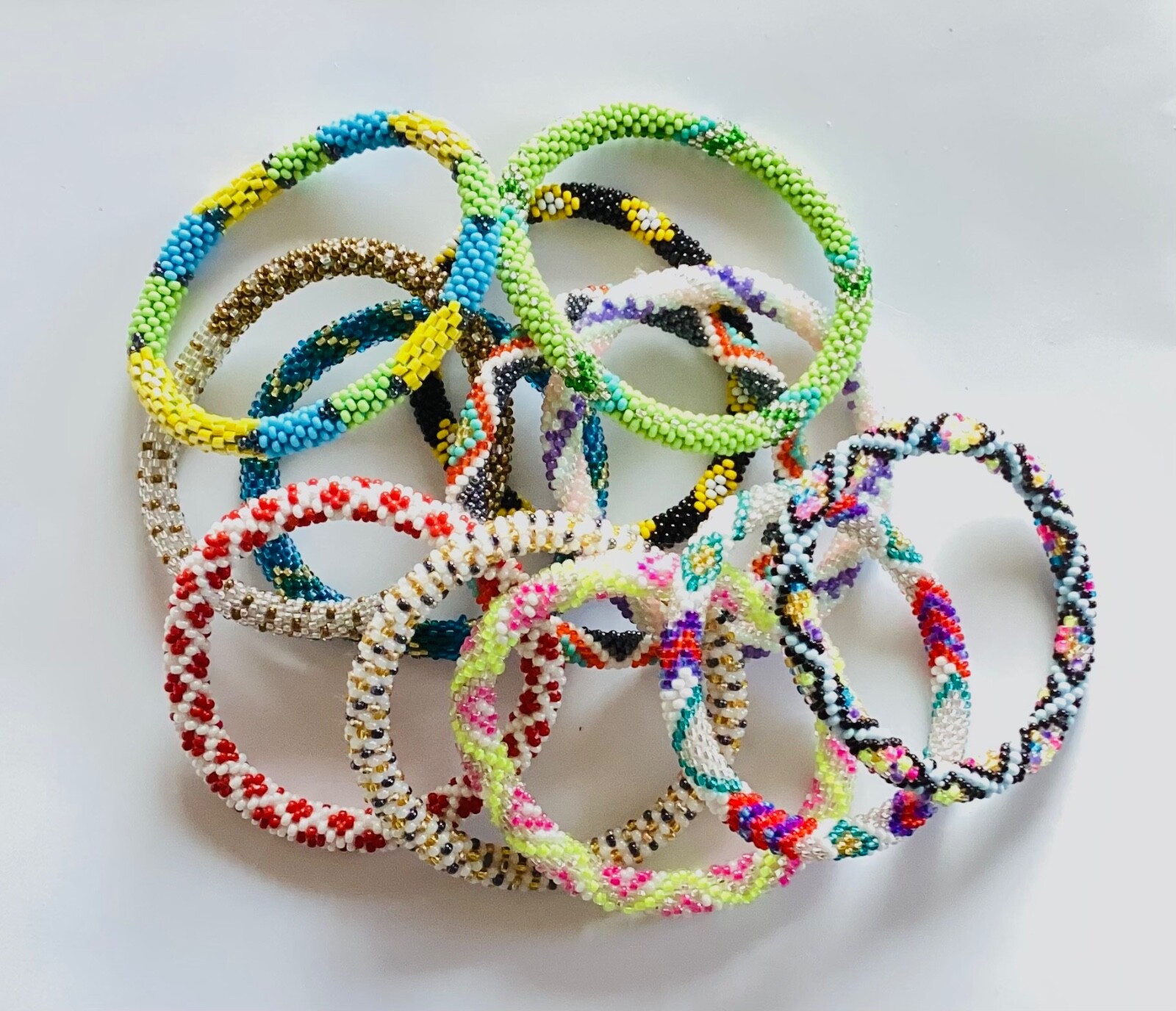 SALE-Wholesale Nepal Glass Beaded Bracelets. 100 pieces. Premium Random Colors.