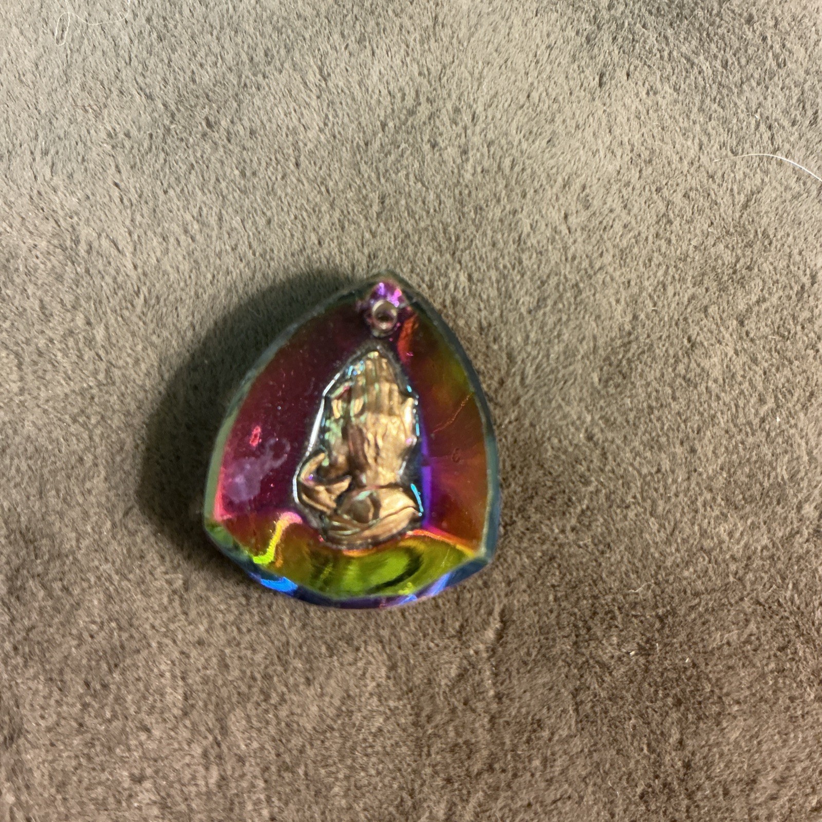 1970s necklace medallion praying hands design aurora borealis foil back Glass