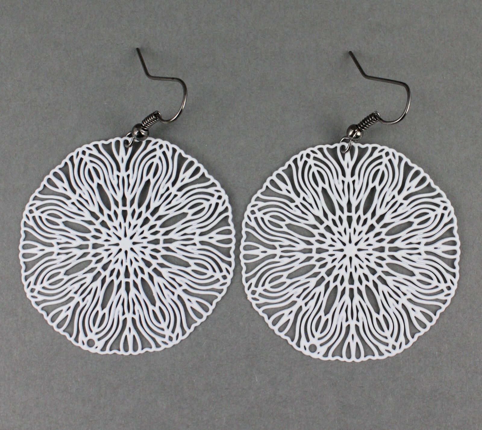 White round earrings cut out flower filigree scroll circle 2 1/8 long very Light